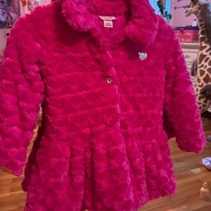 Hot pink girls coat never worn .